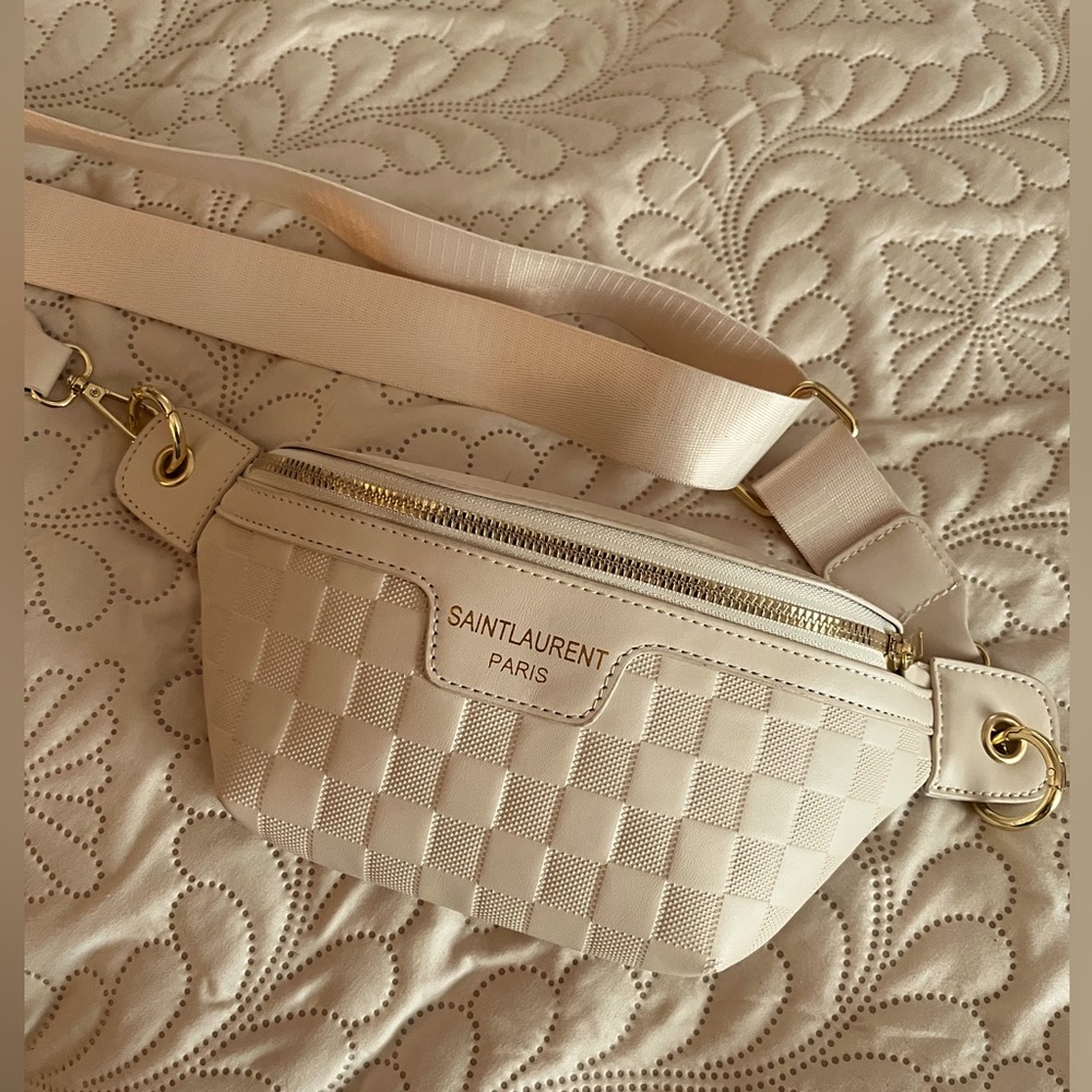 Unbranded adjustable crossbody bag.  Brand new never used. Excellent condition
